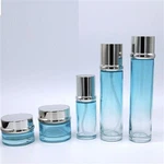 Nuosavo prekės ženklo „Sky Blue Gradient Push Down Essence“ buteliuko kremo buteliukas su aukštos kokybės individualiu pasirinkimu